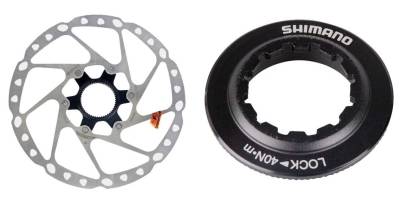 CENTERLOCK: Her har bremseskiven spor, som passer inn på navet. Deretter man setter man på en låsering (t.h.) og strammer. center lock skivebremser sykkel